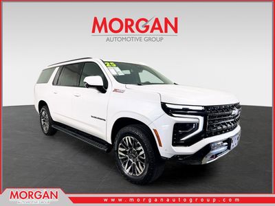 2025 Chevrolet Suburban Z71 in Beige — front three-quarter view