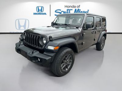 2024 Jeep Wrangler — rear three-quarter view