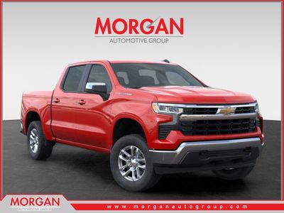 2026 Chevrolet Silverado 1500 LT in Red Hot — front three-quarter view