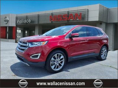 2017 Ford Edge Titanium in Ruby Red Metallic — front three-quarter view