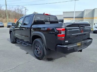 2026 Nissan Frontier — rear three-quarter view