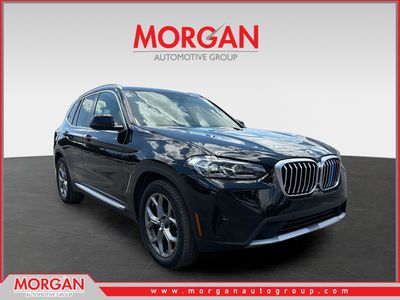 2023 BMW X3 sDrive30i in Jet Black — front three-quarter view