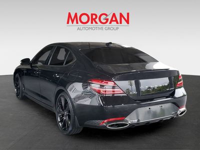 2023 Genesis G70 — rear three-quarter view