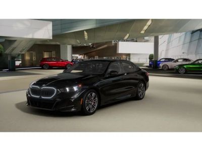 2027 BMW 5 Series 530i xDrive in Black Sapphire Metallic — front three-quarter view