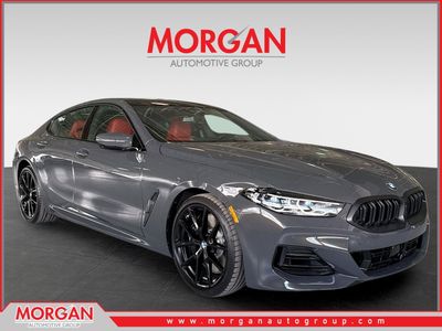 2026 BMW 8 Series 840i in Dravit Grey Metallic — front three-quarter view