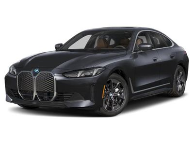 2026 BMW i4 eDrive40 in Black Sapphire Metallic — front three-quarter view