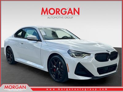 2026 BMW 2 Series 230i xDrive in Mineral White Metallic — front three-quarter view