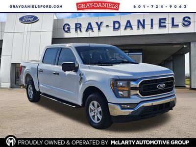 2023 Ford F-150 XLT in Oxford White — front three-quarter view