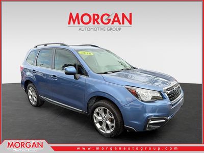 2018 Subaru Forester Touring in Quartz Blue Pearl — front three-quarter view