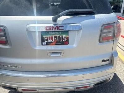 2014 GMC Acadia — rear three-quarter view