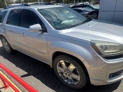 2014 GMC Acadia Denali in Quicksilver Metallic — front three-quarter view
