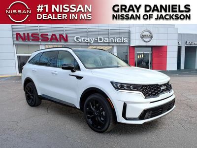 2023 Kia Sorento SX in Glacial White Pearl — front three-quarter view