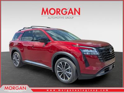 2026 Nissan Pathfinder Platinum in Red — front three-quarter view