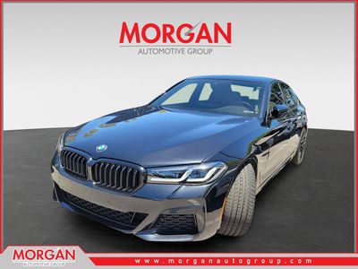 2023 BMW 5 Series 530i in Black Sapphire Metallic — front three-quarter view