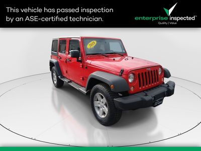 2018 Jeep Wrangler JK Unlimited Sport 4x4 — front three-quarter view