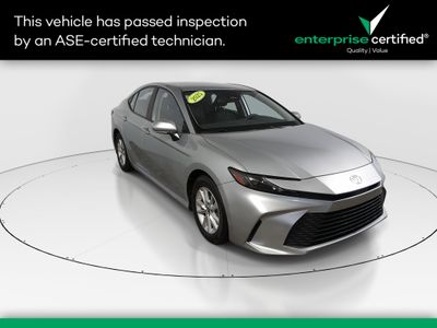 2025 Toyota Camry LE — front three-quarter view