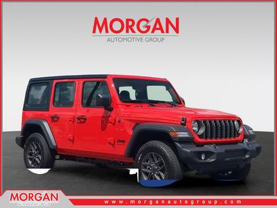 2026 Jeep Wrangler Sport in Red — front three-quarter view
