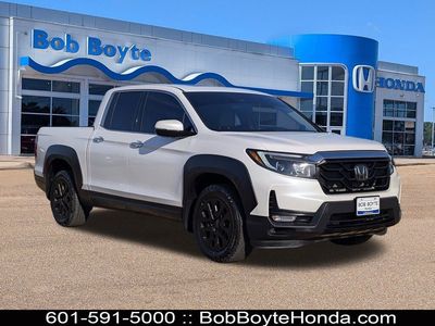 2023 Honda Ridgeline RTL-E in Platinum White — front three-quarter view