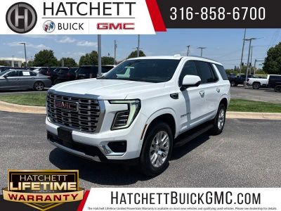 2025 GMC Yukon Denali in Summit White — front three-quarter view