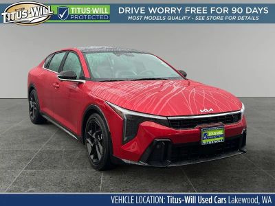 2025 Kia K4 GT-Line Turbo in Currant Red — front three-quarter view