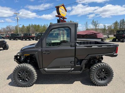 2026 Polaris Ranger XD 1500 Northstar Edition Ultimate R26XAW1RBJ in Super Graphite Smoke — front three-quarter view