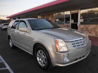 2009 Cadillac SRX in Silver — front three-quarter view