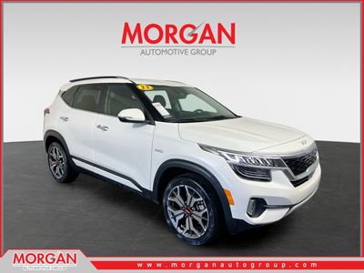 2022 Kia Seltos SX in Snow White Pearl — front three-quarter view