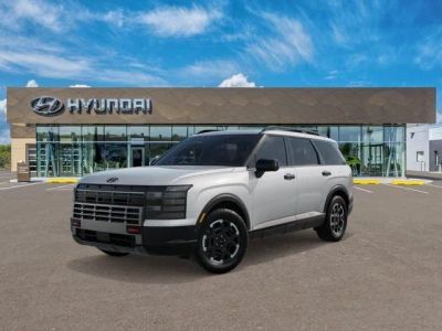 2026 Hyundai PALISADE XRT Pro in White Pearl — front three-quarter view