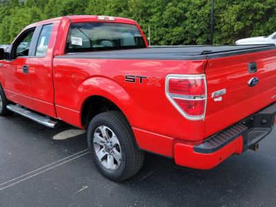 2013 Ford F-150 — rear three-quarter view