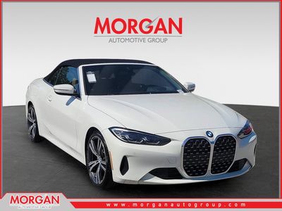 2022 BMW 4 Series 430i in Alpine White — front three-quarter view