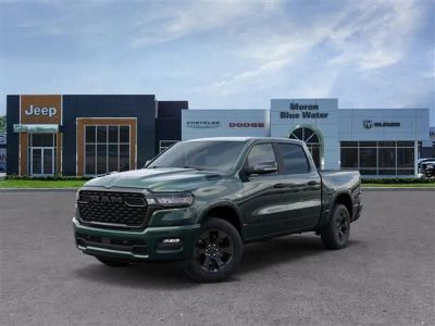 2026 RAM Ram 1500 RAM 1500 BIG HORN CREW CAB 4X4 5'7' BOX in Serrano-Green Metallic Exterior Paint — front three-quarter view