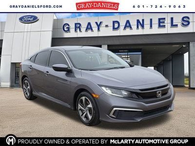 2019 Honda Civic LX in Modern Steel Metallic — front three-quarter view