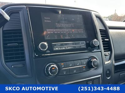 2022 Nissan Titan in Deep Blue Pearl Metallic — front three-quarter view