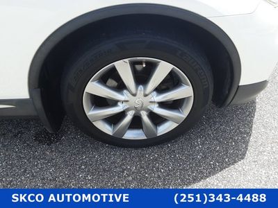 2016 INFINITI QX50 in Majestic White — front three-quarter view