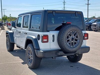 2026 Jeep Wrangler — rear three-quarter view