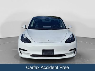 2023 Tesla Model 3 — side profile view