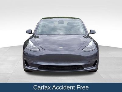 2023 Tesla Model 3 — side profile view