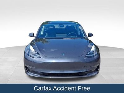 2023 Tesla Model 3 — side profile view