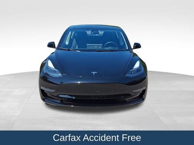 2023 Tesla Model 3 — side profile view