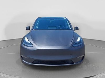 2024 Tesla Model Y — side profile view