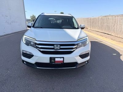 2016 Honda Pilot — rear three-quarter view