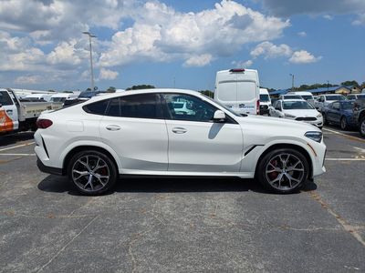 2022 BMW X6 — rear three-quarter view
