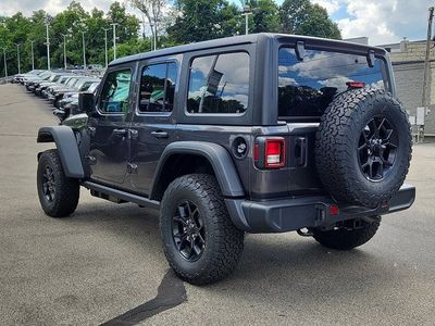 2026 Jeep Wrangler — rear three-quarter view