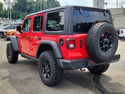 2026 Jeep Wrangler — rear three-quarter view