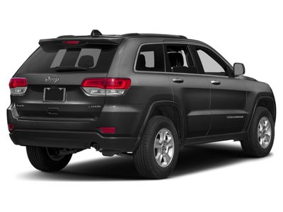 2015 Jeep Grand Cherokee — rear three-quarter view