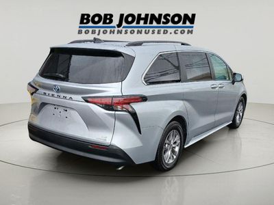 2021 Toyota SIENNA LE — rear three-quarter view