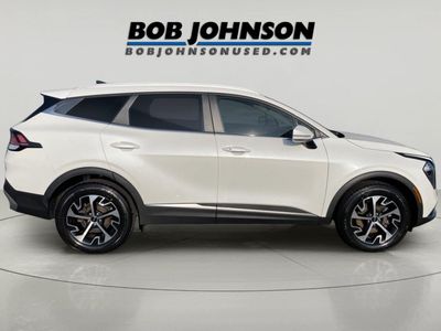 2023 Kia Sportage Hybrid — side profile view