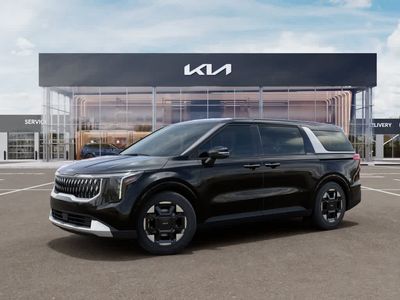2026 Kia Carnival — rear three-quarter view