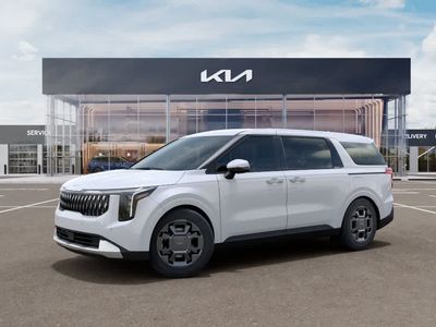 2026 Kia Carnival Hybrid — rear three-quarter view