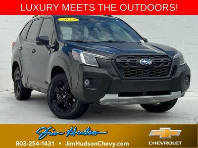 2023 Subaru Forester Wilderness in Crystal Black Silica — front three-quarter view